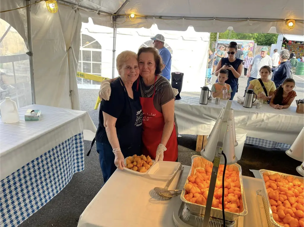 Fresh loukoumades being served